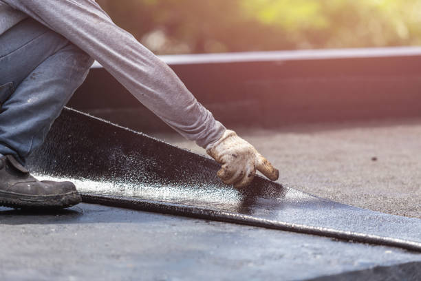 Professional Exterior Waterproofing technician working in Munith, MI